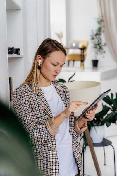 Woman using her tablet/ipad screen