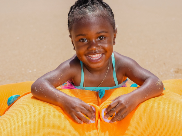 Girl playing in the sand