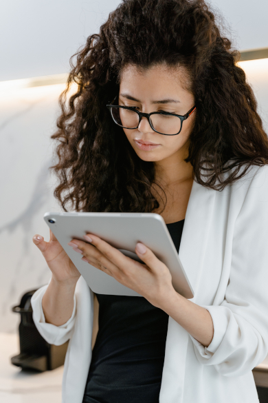 Imagine a woman using the portal to give online Woman with tablet/ipad